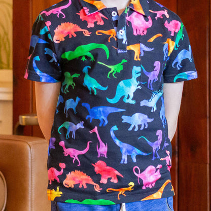 "Prehistoric Parade" Rainbow of Dinosaurs Short Sleeve Polo Shirt